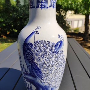 Old Asian/Japanese handcrafted baluster vase. Hand painted ceramic. Decorated with 2 peacocks floral motifs & blue monochrome floral friezes