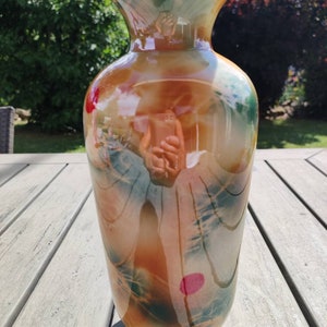 Vintage designer ceramic vase, pearly/varnished finish Decorated with abstract patterns in orange & green tones and red balls Height 25 cm