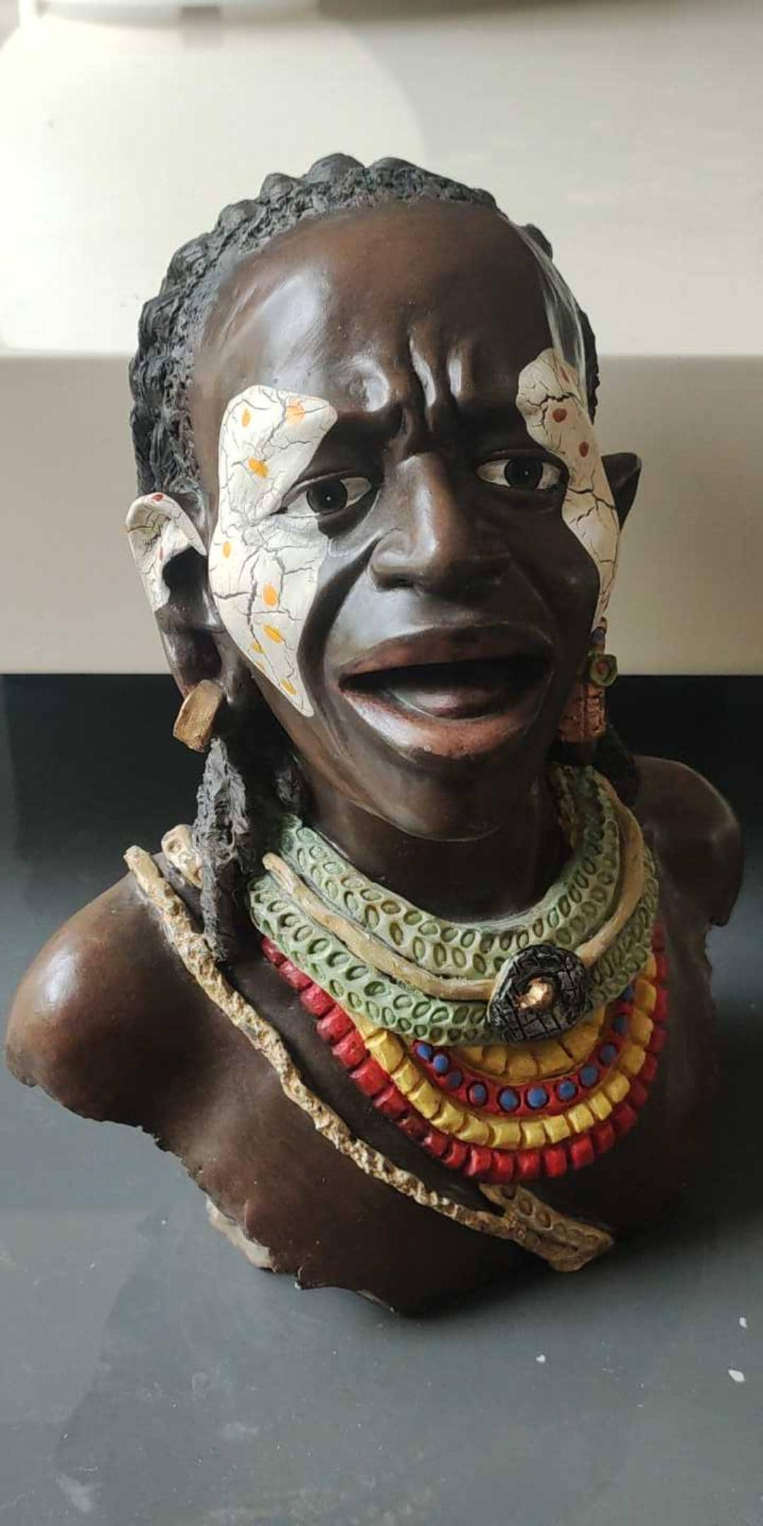 Sculpture Bust of a Maasai/African Ethnic Tribal Warrior, adorned with jewelry, the face enhanced with typical ethnic makeup/Dim 22 x 20 cm