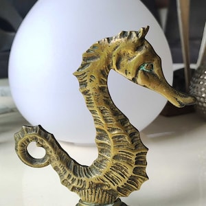 Figurine of a Seahorse/Marine animal. In gilded bronze. Greece. Size 15 x 14 cm