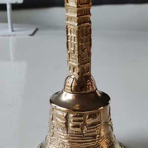 Antique style table bell/Hand bell, delicately chiseled with engravings of Christopher Columbus&#39; ships. La Pinta, La Nina, La Santa Maria