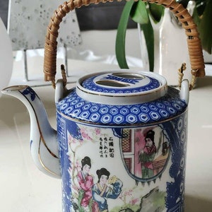 Fine Asian/Japanese porcelain teapot with woven bamboo imitation handle. Vintage 50s. Geisha Patterns in Kimono, nature
