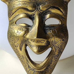 Theater/comedy-drama mask. Mask of tragedy. In finely hand-carved brass.Origin/India