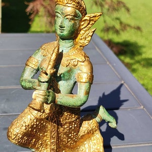 Sculpture Buddha Teppanom Musician/Sacred Angel, guardian and protector Temple in Thailand, in bronze with green and gold patina. Height 20 cm