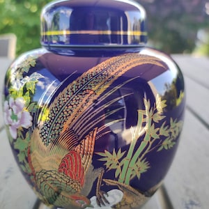 Tea box/Ginger box. In fine Asian cobalt blue porcelain. Decorated with peacock & floral/bamboo motifs with 24c gold inlays