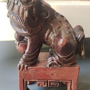 Chinese Foo Dog Sculpture/Guardian Lion of Ancient Chinese Temples & Feng Shui/Home Protector/ in exotic wood. Signed. Dimensions: 20 x 14 cm