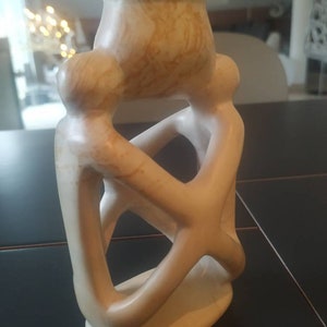 African Artisanal Art. Abstract stone candle holder handmade in Kenya. Representing an embracing couple/Fusionnel Haut. 15 cm. Like new