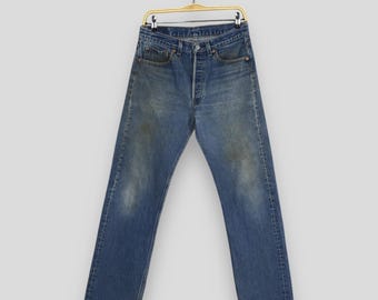 Talla 28x28 Jeans Levi's 501XX de pierna recta, estilo vintage de los años 80. Jeans Levi's con cierre de botones. Levi's 501 Lightwashed. Levi's de cintura alta, desteñidos, talla W28.