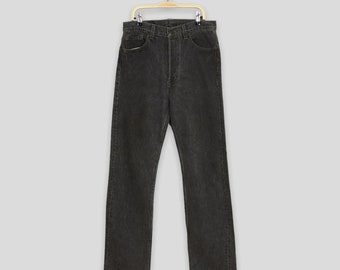 Vintage 80s 501 Levis black denim red tab straight leg jeans