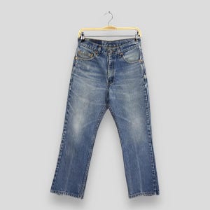 Size 28x25.5 Vintage 90s Levi&#39;s 517 Faded Blue Bootcut Jeans Stonewash Levi&#39;s Zipper Denim Levi&#39;s 517 Flared Jeans Levi&#39;s 517 Ladies Mom W28