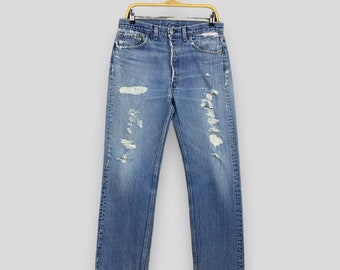 Talla 31x29 Vaqueros Levi's 501 azules descoloridos vintage de los años 90 Vaqueros Levi's de corte recto con lavado claro Vaqueros Levi's 501 con bragueta de botones Vaqueros Levi's Usa W31