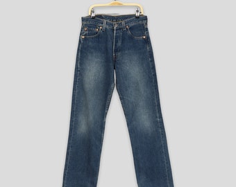 Talla 27x28 Jeans Levi's 501 azul desteñido vintage de los 90 Jeans Levi's de pierna recta de los 90 Jeans Levi's con cierre de botones Jeans Levi's 501 estilo mom W27