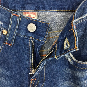 May include: A set of three ceramic mugs with a speckled, matte finish. The mugs are in shades of cream, light gray, and dark gray. Each mug has a simple, minimalist design, perfect for coffee or tea.