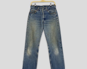 Talla 29x27 Vaqueros vintage Levi's 501XX lavados a la piedra azul Vaqueros Levi's de cintura alta Levi's de los años 90 Vaqueros de mezclilla descolorida Vaqueros Levi's de lavado claro W29