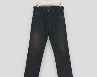 Talla 29x28 Vaqueros vintage Levi's 607 negros de pierna recta, vaqueros Levi's de los años 90, vaqueros desgastados Levi's Mom, vaqueros Levi's para mujer W29