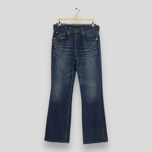Talla 29x30 Vaqueros acampanados Levi&#39;s 517 vintage con corte de bota, denim lavado claro, vaqueros Levi&#39;s lavados a la piedra de los años 90, vaqueros Levi&#39;s desgastados con cremallera W29