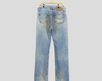 Size 32x32.5 Vintage 90s Levi's 501 Light Blue Jeans Stone