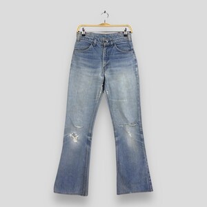 Vintage 70s Levi's 517 Flared Jeans: Distressed Pale Blue Bootcut