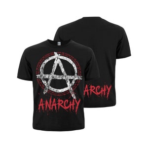 Peut inclure: T-shirt noir avec un symbole anarchique blanc et le mot "Anarchie" en peinture rouge qui coule. Le dos du t-shirt affiche le mot "Anarchie" en peinture rouge qui coule.