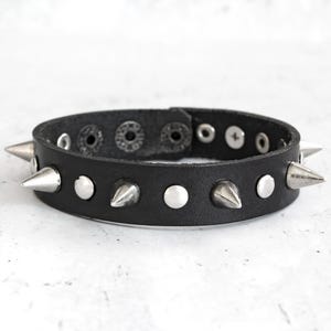 Black Leather Bracelet with Spikes & Holnitenes – Edgy, Punk-Inspired Wristband for Bold, Alternative Style. Handmade in Ukraine.