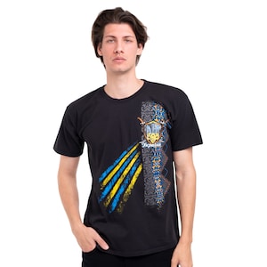 May include: Black t-shirt with a graphic design featuring the Ukrainian coat of arms, a yellow and blue stripe pattern, and the word "Ukraina" in Cyrillic script.