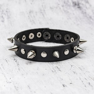 Black Leather Bracelet with Spikes & Holnitenes – Edgy, Punk-Inspired Wristband for Bold, Alternative Style. Handmade in Ukraine.