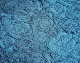 Cloque jersey petrol with turquoise roses
