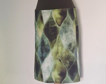 Knee-length green skirt