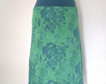 Knee-length skirt in cloque jersey with waistband in green, pattern: roses