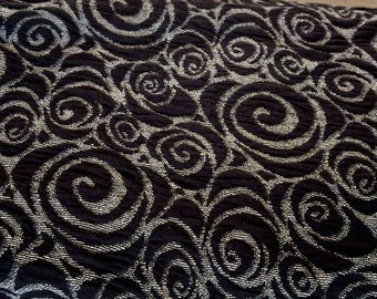 Cloque jersey in black and beige with spiral lining