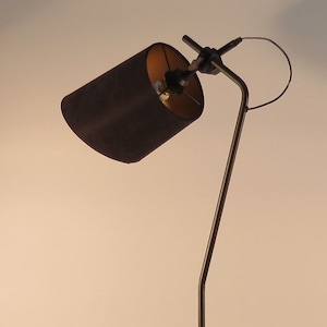 Handmade floor lamp with flexible lampshade, black lampstand, unusual and modern style, different colors of the lampshade, interior, decor