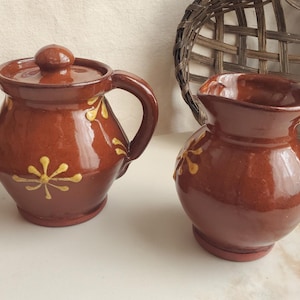 Redware Sugar and Creamer Set with Slip Motif