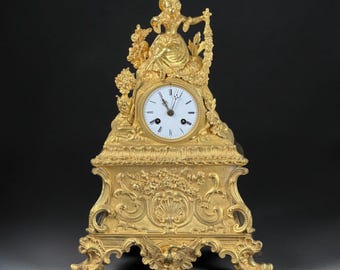 Reloj de sobremesa con figura de bronce dorado francés de mediados del siglo XIX, Japy Frères & Bazelaire, 15,4 pulgadas.