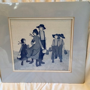 May include: A framed blue and white print of a group of children wearing traditional clothing and carrying buckets. The print is set against a white background.