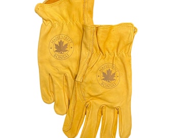 May include: A pair of yellow leather work gloves with the logo "Maple Street Bonsai" on each glove.
