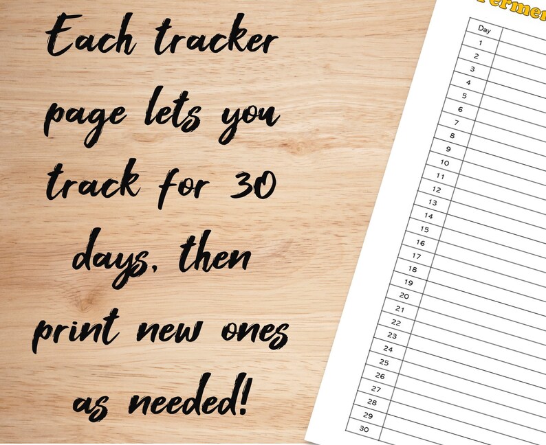 May include: A printable 30-day tracker page with the text "Each tracker page lets you track for 30 days, then print new ones as needed!"  The page is on a woodgrain background.