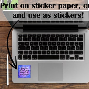 May include: A laptop computer with a sticker on the touchpad that reads "Gratitude attracts more things to be grateful for". The sticker has a watercolor background with shades of purple, blue, and pink.