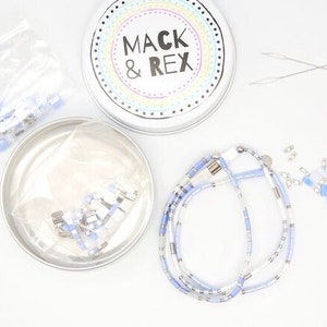 image of the top view of the DIY Bracelet Making Kit and some bracelets on a white surface







DIY Bracelet Making Kit | Makes 3 Bracelets | Beaded Bracelet Kit | Tila Bead Bracelet Kit | Jewelry Making Kit | Adults & Kids Craft Beads