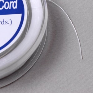 image of the 20 Meters Miyuki Stretch Cord on display








20 Meters | Miyuki Stretch Cord 0.3–0.5mm Elastic for Jewelry Making | Clear Elastic String for Bracelets, Beading, and DIY Craft Projects