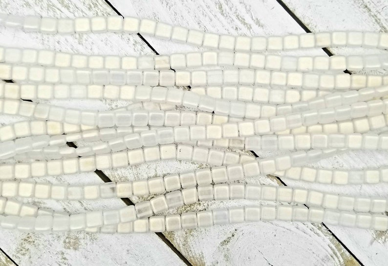 Sueded Gold Crystal Czechmate tile beads 79080CR