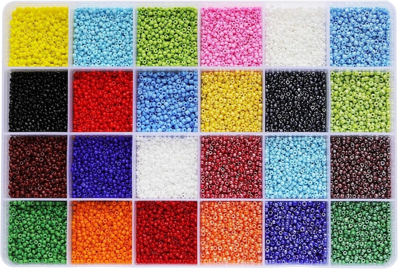 a bunch of different colors of beads