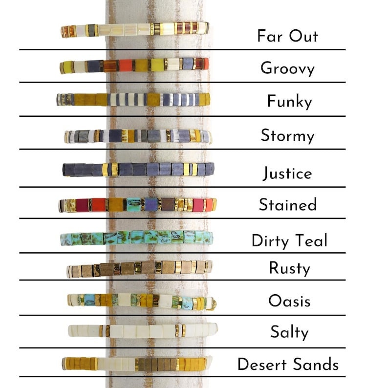 a stack of bracelets with different colors and sizes
