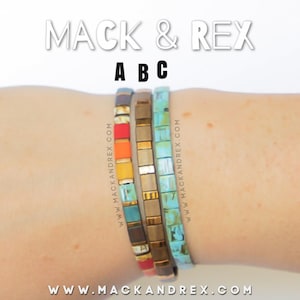 May include: Three colorful bracelets stacked on a wrist. The bracelets are made of small square tiles in shades of turquoise, orange, yellow, red, brown, and gold. The text "www.mackandrex.com" is printed on the back of the bracelets.