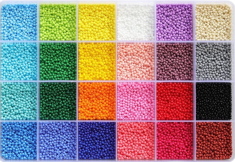 a bunch of different colors of beads