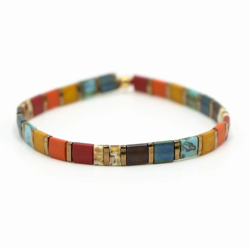 image of the STAINED Handmade Bracelet in a white background








STAINED Handmade Bracelet | Bohemian Tila Bracelet | Waterproof Beaded Bracelet | Comfortable Stretch Bracelet | Mack and Rex Jewelry
