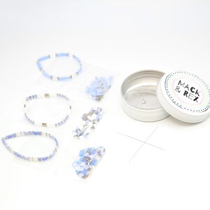image of the top view of the Lavender Sky DIY Bracelet Kit and some bracelets on a white surface











Lavender Sky DIY Bracelet Kit | Makes 3 Stackable Bracelets | Tila Bead Jewelry Making Kit for Women Teens | Craft Gift for Holidays