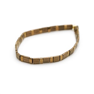a wooden accent bracelet on a white background















Shoreline Mix & Match Tila Bead Bracelets for Women | High Quality Stacking Bracelet | Boho Stretch Bracelet | Waterproof Miyuki Tila Beads