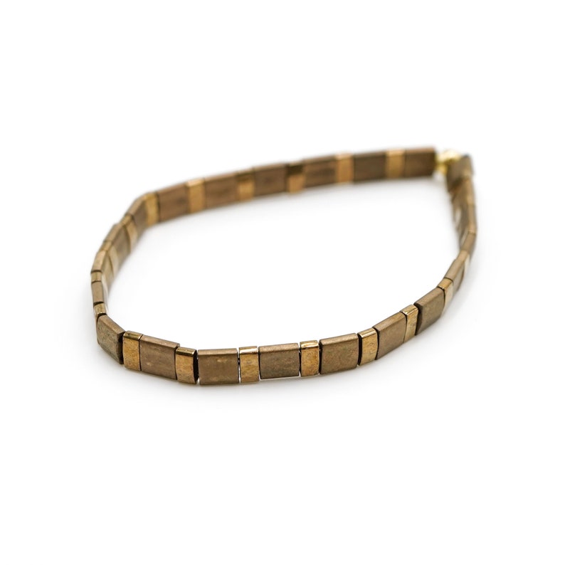 a wooden accent bracelet on a white background















Shoreline Mix & Match Tila Bead Bracelets for Women | High Quality Stacking Bracelet | Boho Stretch Bracelet | Waterproof Miyuki Tila Beads