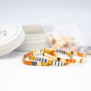 image of the DIY Bracelet Making Kit and some bracelets on a white surface







DIY Bracelet Making Kit | Makes 3 Bracelets | Beaded Bracelet Kit | Tila Bead Bracelet Kit | Jewelry Making Kit | Adults & Kids Craft Beads