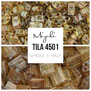 May include: A close-up image of a pile of gold and clear glass beads. The beads are rectangular and have a slightly iridescent finish. The text "Miyuki TILA 4501 WHOLE & HALF" is visible in the image.